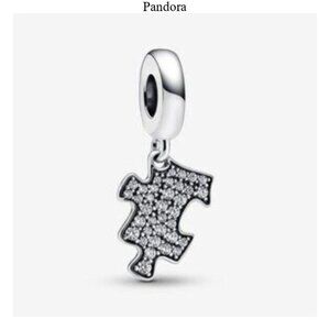 Authentic Pandora Sparkling Puzzle Piece Dangle Charm.